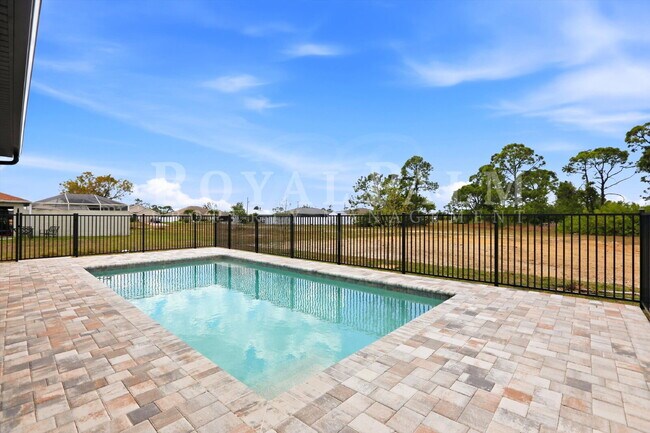 Building Photo - 3BR/2BA New Construction with Pool, Fence & Garage — Built Yesterday, Ready Today - Cape Coral