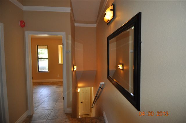 Upstairs hallway looking at Bedroom #2 and the stairs going down to the main floor - 13059 Lincoln Way