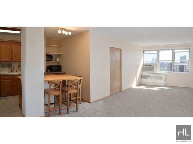 Building Photo - Junior 4 apartment for rent with open kitc...