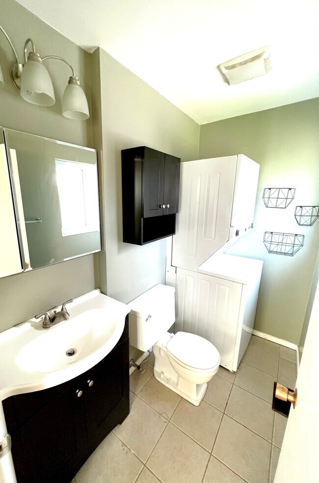 Master bathroom with en suite laundry - 3096 S Marie Cir
