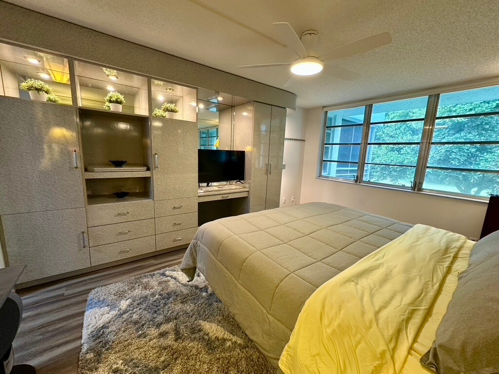 Primary Bedroom with King Adjustable Bed - 933 Cypress Grove Dr