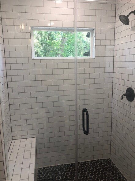 walk in shower with bench in 1st bathroom - 1742 W Main St