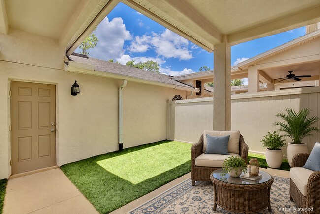 Building Photo - Beautiful 3/2.5 Spacious Townhome with a Private Courtyard and a 2 Car Garage in the Desirable Sa...