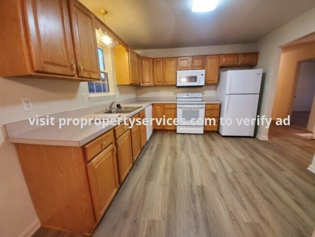 Building Photo - Charming Raised Rancher With Lawn Care Included