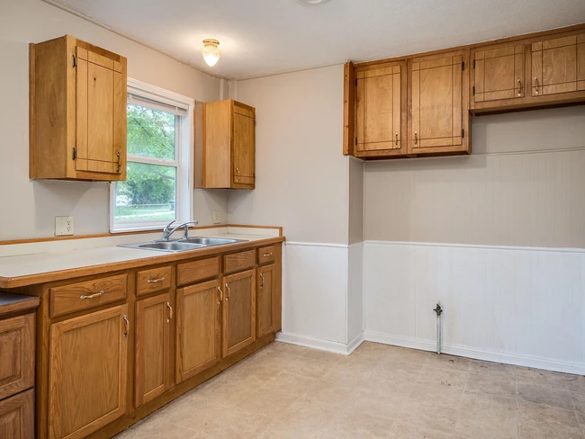 Kitchen - now has stove & fridge - 2708 N Fremont Ave