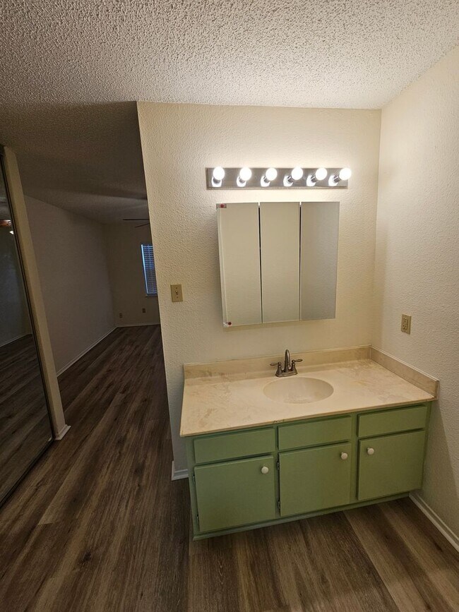 Building Photo - Beautifully Updated 2BR/2BA with Loft Oasis – Safe & Gated Community