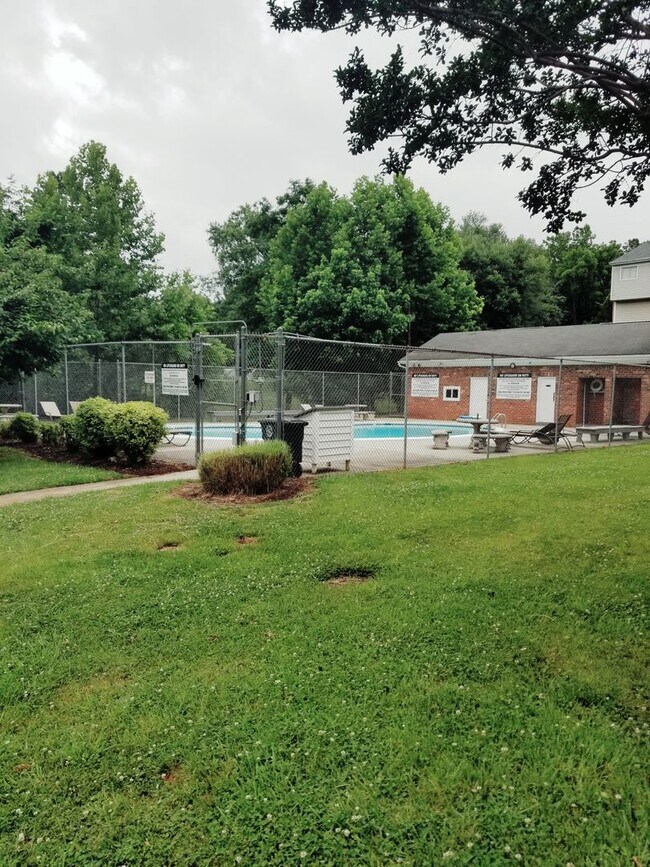 Building Photo - A spacious 3-Bedroom 1.5-Bathroom 3 Story Townhouse off of Old Forest Road With a Pool