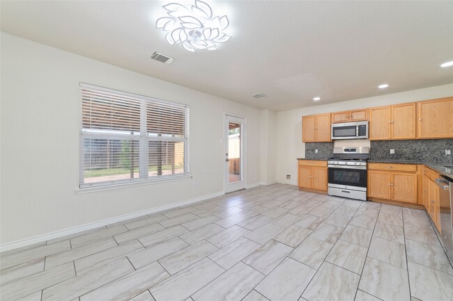 Building Photo - 8418 Village Rose Ln