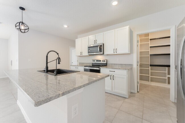 Building Photo - "Spacious 5-Bed Oasis located in SouthShore Bay!
