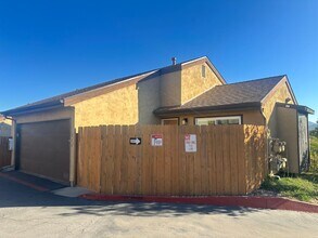 Building Photo - 2BR/1.5BA 2-story condo in El Cajon, gated community with sparkling pool, 2 car attached garage, ...