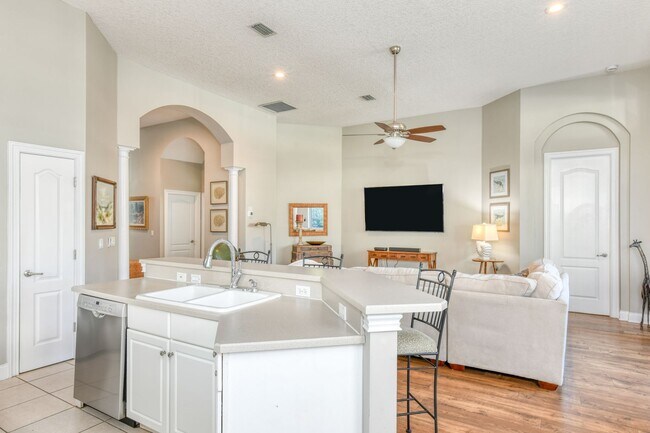 Building Photo - Spacious 4BR Retreat w/ Fenced Yard + Resort Amenities