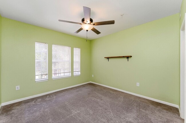 Building Photo - IMMACULATE 2nd Story condominium with so m...