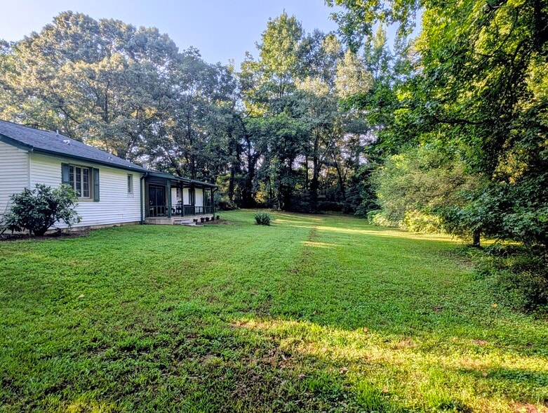 Enjoy the peaceful back yard. Lawn maintenance and landscaping provided! - 1128 Otello Ave