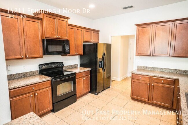 Building Photo - Spacious and Modern 4-Bedroom Home with a ...
