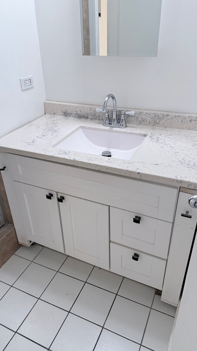 remodeled bathrooms - 7617 De Longpre Ave