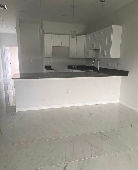 Building Photo - 705 Harry Ave S