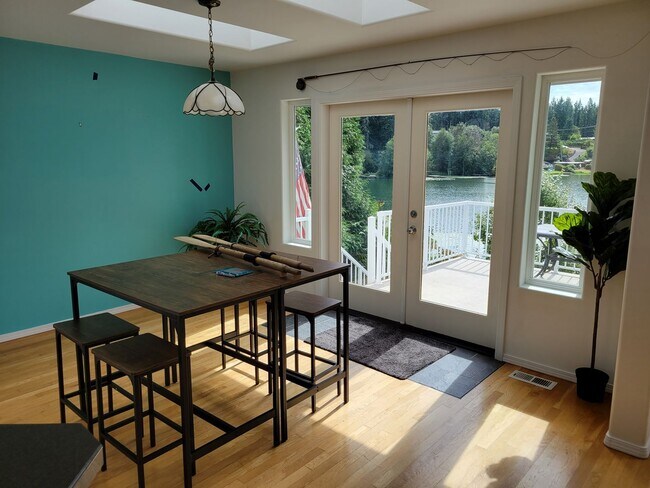 Building Photo - Lake Retreat Waterfront Living | Spacious Home with Views + Utilities Included