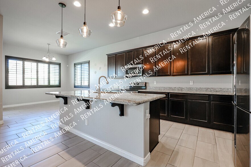 Building Photo - 8544 W Midway Ave