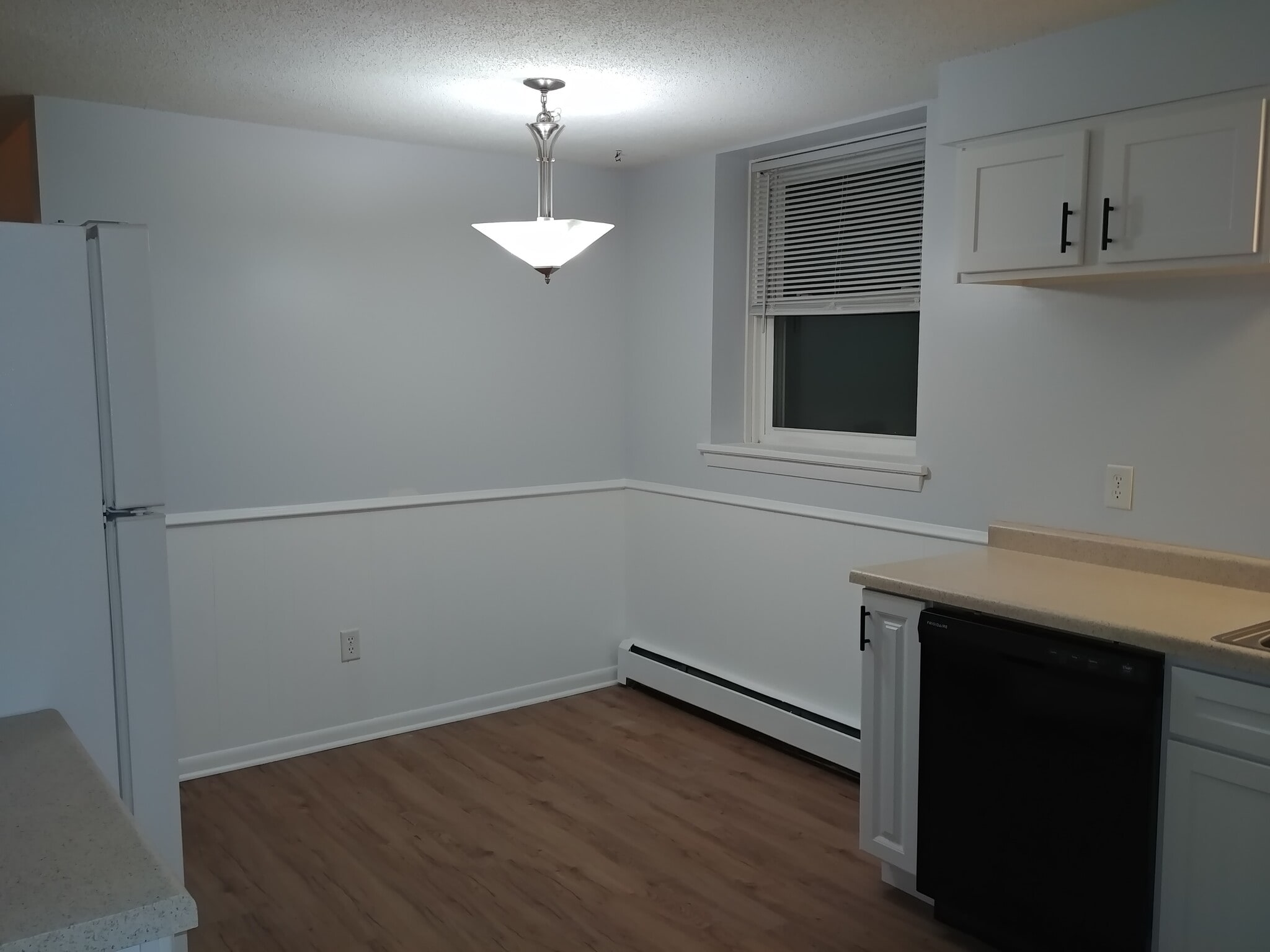 Eat-in kitchen space, walk-in pantry at back entry to kitchen - 92 Logan Ave W