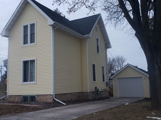 Side: 1 car garage + additional parking - 204 Edna St