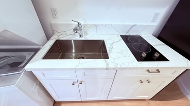 Building Photo - $1,000 of first months rent!!  - Brand New Studio w/ In Unit Washer & Dryer