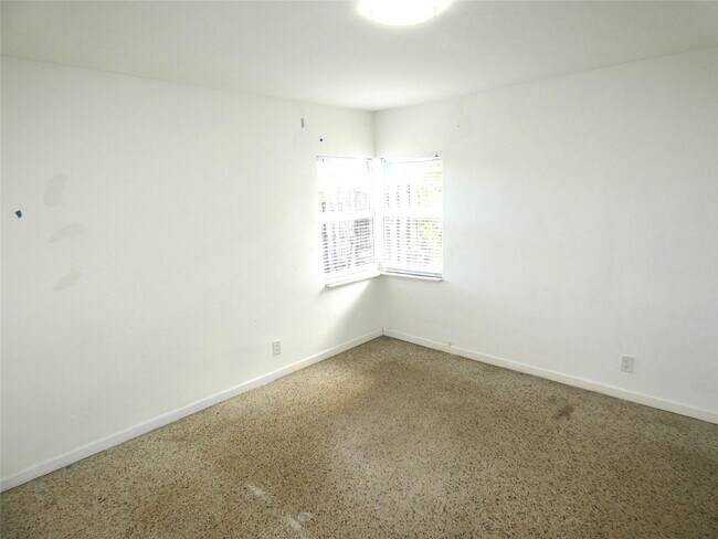 Building Photo - 5448 NE 3rd Ter.