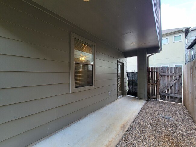 Building Photo - Elegant Gated Townhome Offering Unparallel...