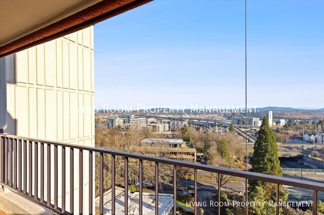 Building Photo - Downtown Condo with Stunning Views and Mod...