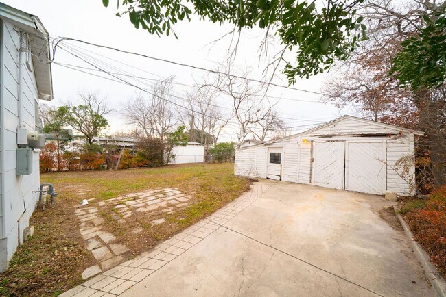 Building Photo - LAWN CARE INCLUDED! Updated 3-Bedroom Home with Detached Garage & Fenced Yard