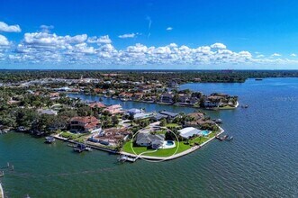Building Photo - Amazing waterfront home, Sunsets included!