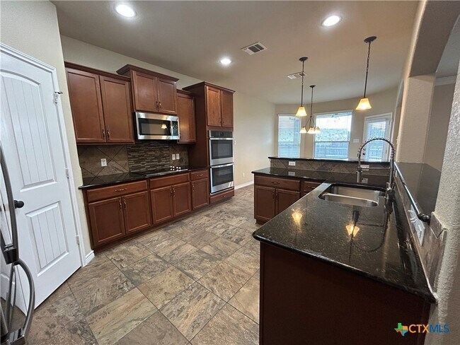 Building Photo - 803 TUSCAN Rd