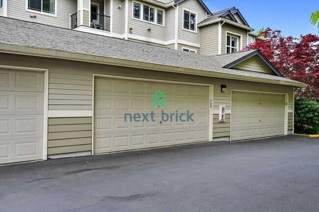 Building Photo - Rare Ground-Floor, End Unit with massive b...