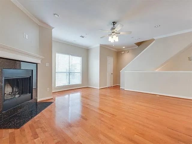 Living Room with view of half bath and upstairs - 2407 Stutz Dr