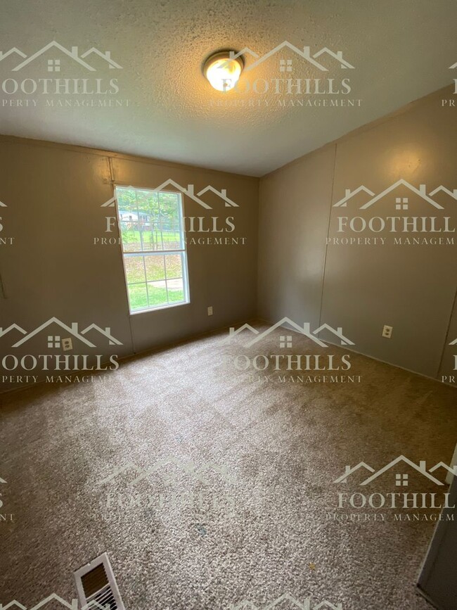 Building Photo - Spacious 4-Bedroom Double-Wide Mobile Home...