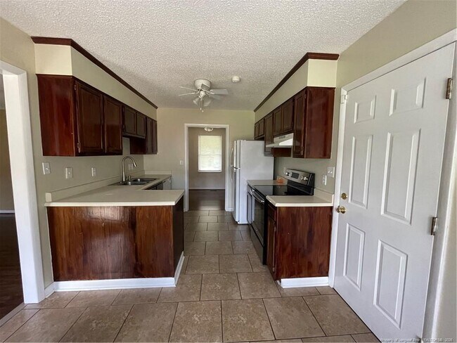 Building Photo - 6717 Sandfield Ct