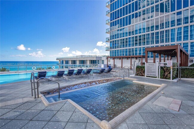 Building Photo - 6899 Collins Ave