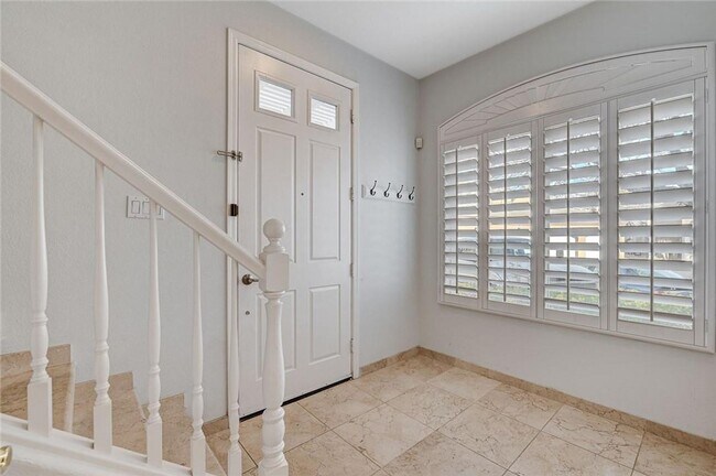 Building Photo - Amazing condominium in gated upscale neigh...