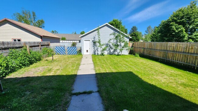 Building Photo - Beautiful House with Yard and Pets Considered
