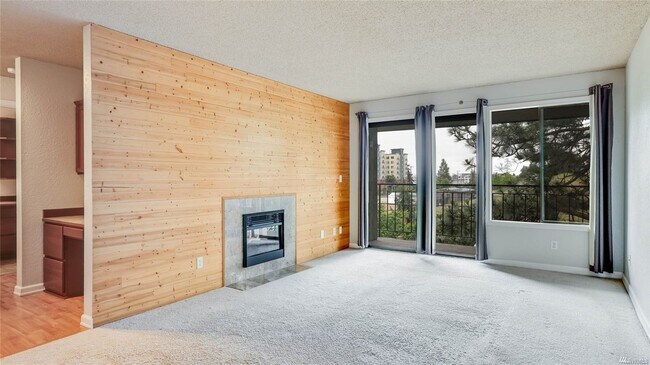 Building Photo - Light filled top floor condo.