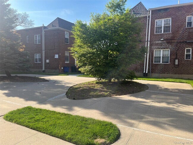 Building Photo - 208-08-208-39 39th Ave