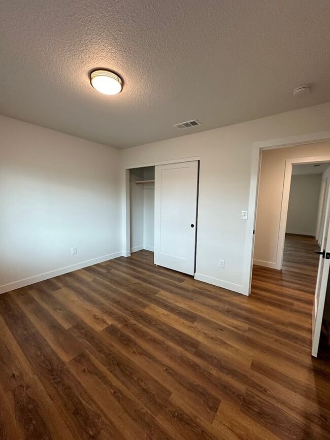 Building Photo - Updated Home with Island Kitchen, LVP Flooring, and Yard Care Included!