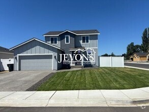 Building Photo - Beautiful 4-bedroom home with fenced backy...