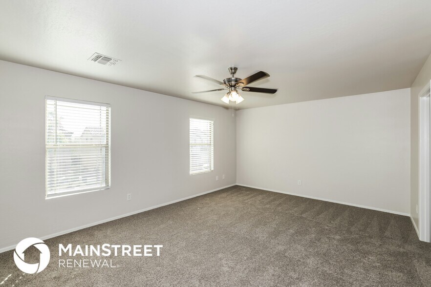 Building Photo - 11216 W College Dr