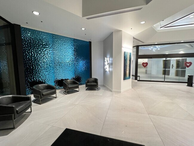 Building Photo - Contemporary condo on the 10th floor inclu...