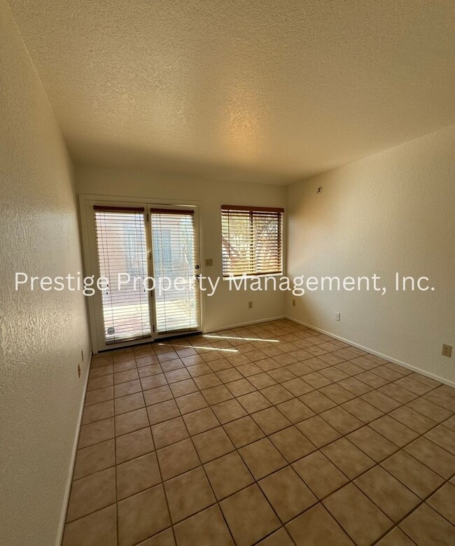 Building Photo - Totaling 3/3 With The Guest House; This Lovely Central Townhome is Everything You Need!