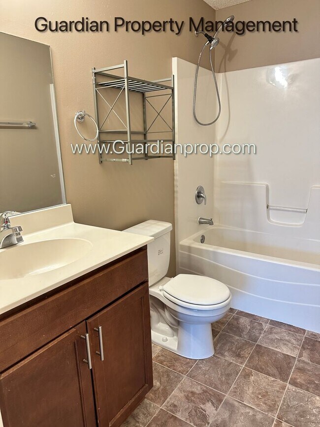 Building Photo - Champlin Town Home, 2 Car Garage, Dishwasher, Washer/Dryer, Balcony, July/Aug 1st Move In