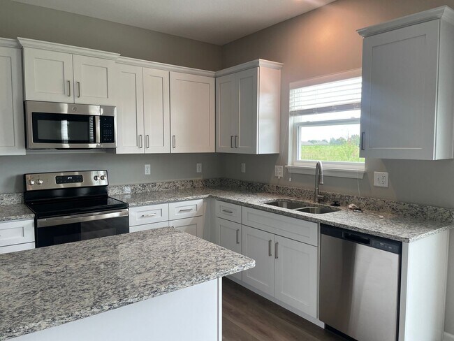 Building Photo - 4 bedroom available in Blue Springs! Coming Soon!