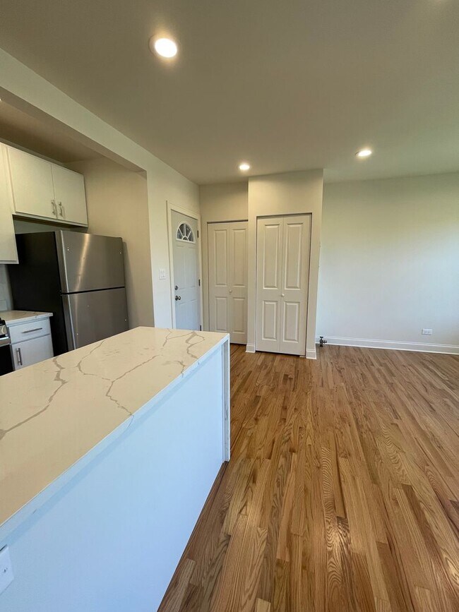 Building Photo - Brand New Renovation! 3 BR/ 2 BA On Quiet ...