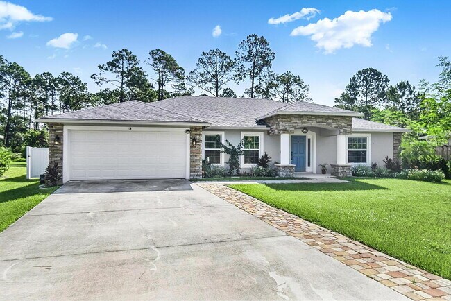 Building Photo - Modern 4-Bedroom, 3-Bath Home with Private In-Law Suite – Palm Coast, FL