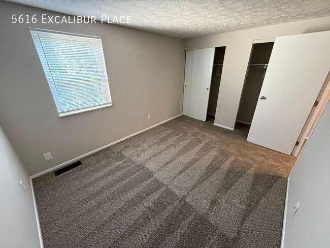 Building Photo - 5616 Excalibur Pl